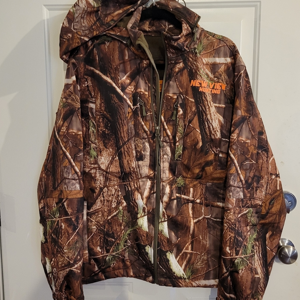 Like new men's camo coat and pants. Size Medium inseam 30"